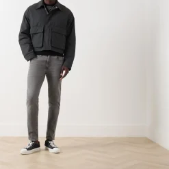 512™ Mid-Rise Slim Tapered Jeans