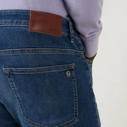 Delaware Mid-Rise Slim Leg Jeans